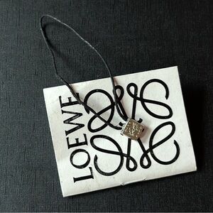 LOEWE SILVER CHARM BRACELET WITH BOX.